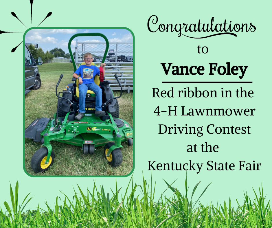 boy on lawnmower