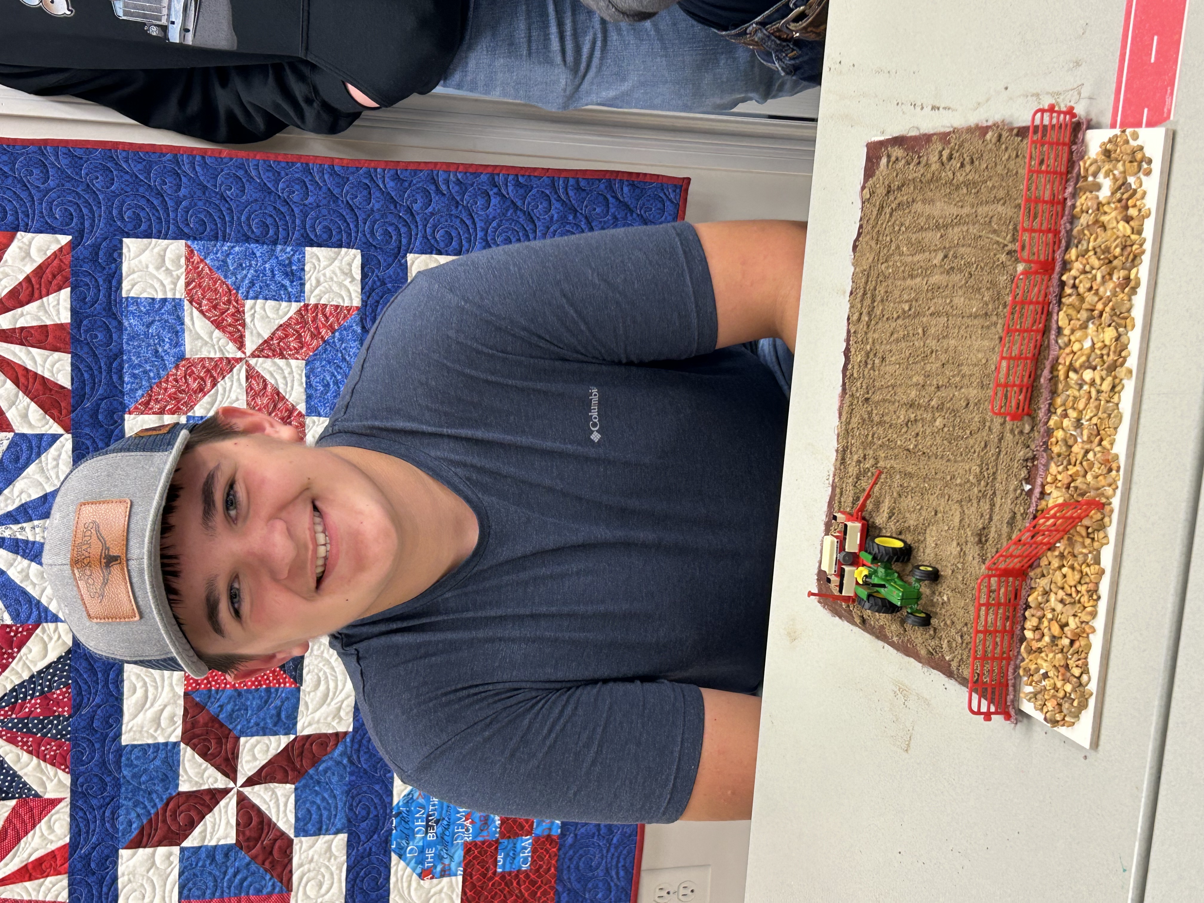 Boy with farm toys