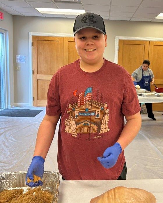 Boy curing country ham